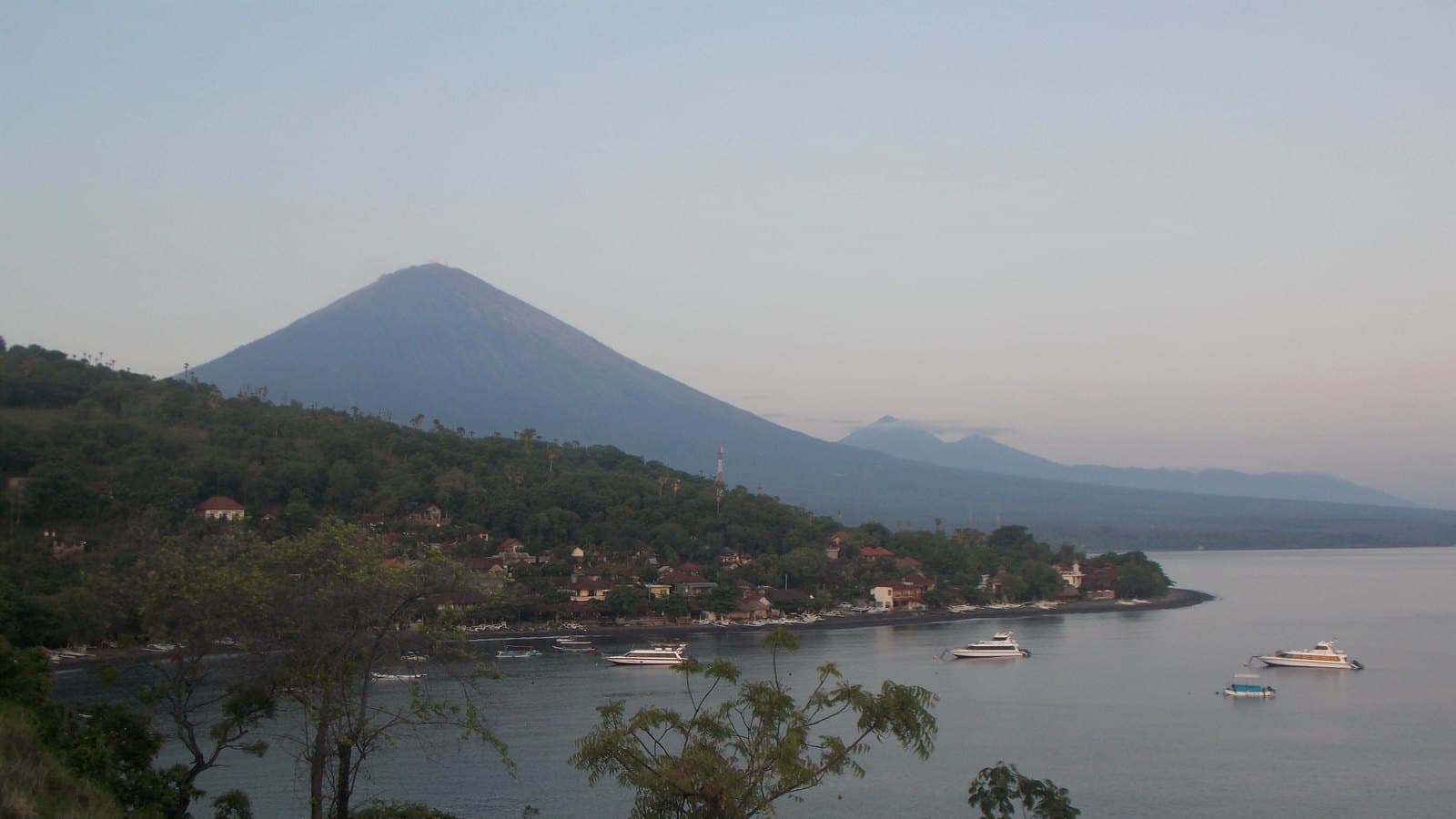 Mount Agung rising above the coast at Amed, its summit clear of cloud in the early morning