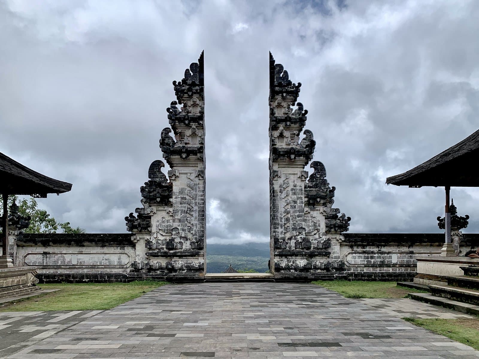 The split gate of Pura Penataran Agung Lempuyang, the volcano behind it hidden in cloud